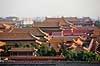 Den Forbudte By. Den Forbudte By med Beijing i baggrunden set fra Jingshan Park.  Den Forbudte By / Beijing Kina   Palace Museum, The Forbidden City, Det kejserlige palads, UNESCO Verdens Kulturarv, UNESCO World Heritage