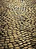 Brosten. Gade belagt med brosten i byen Lviv, der er regionshovedstad i Lviv Oblast (polsk: Lw�w, Lwow, tysk: Lemberg). V�rtsby til Euro 2012  Lviv Ukraine   Leopolis, UNESCO's Verdensarvsliste, Unesco World Heritage, Europamesterskab 2012, Euro12, brostensbelagt