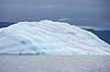 Isbjerge. Isbjerg, der er rullet rundt s� den afsmeltede bund ses, foran Arveprinsens � nord for Ilulissat  Ilulissat Gr�nland   Jakobshavn, isbjerge, iceberg, icebergs