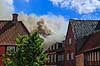 Husbrand. Tagbrand i gammelt hus i Skolegade i Ribe  Ribe Danmark   Brand, ildebrand, brandslukning, forsikring, brandforsikring