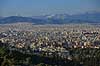 Athen. Udsigt over Athen med sned�kkede bjerge i horisonten set fra Akropolis  Akropolis / Athen Gr�kenland  Sev�rdigheder Hovedstad, hovedst�der, storbyer, Hellas, Acropolis
