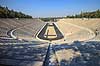 Kallimarmaro. Panathenaic Stadium, eller Kallimarmaro, er et sportsstadion i Athen, hvor de f�rste moderne Olympiske lege blev afholdt i 1896. Det er rekonstrueret fra resterne af det oldgr�ske stadion p� stedet, og Panathinaiko er det eneste st�rre stadion i verden, som er bygget helt af hvid marmor  Kallimarmaro / Athen Gr�kenland  Sev�rdigheder Hellas