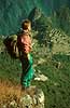 Trekker on Inca Trail. In the background Machu Picchu.  Inca Trail / Cuzco Peru South America  