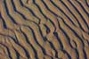 Patterns in sand on beach at Uggerby Strand   Denmark   